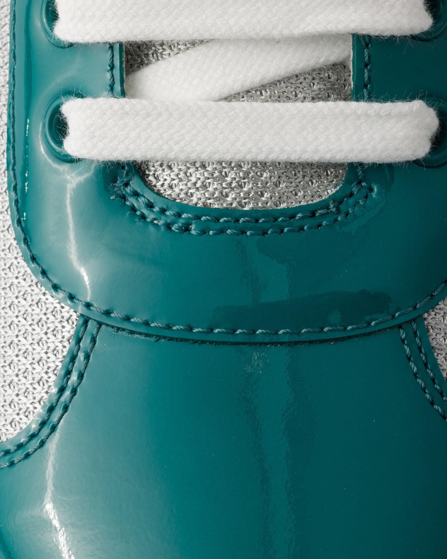 Sneakers Prada America’s Cup en cuir verni et tissu technique